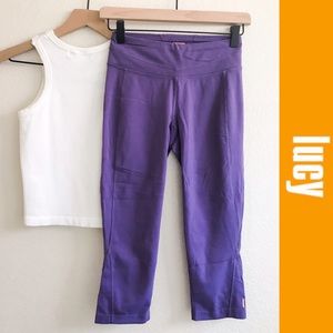 Women’s Lucy Activewear Hatha Capri Compression Leggings. Purple, size XS